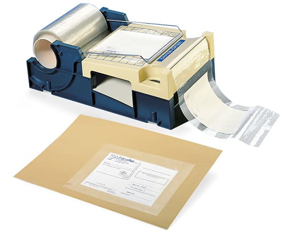 Abrollgerät für Adressenschutzfilm mit Messer